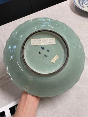 A Chinese famille rose Guanyin and a celadon-glazed dish, Chenghua mark, Qianlong/Jiaqing — photo 2