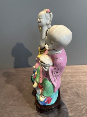 A Chinese famille rose 'Hehe Erxian' group on a wooden stand, Qianlong — photo 4
