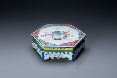 A Chinese famille rose hexagonal 'antiquities' stand, Yongzheng