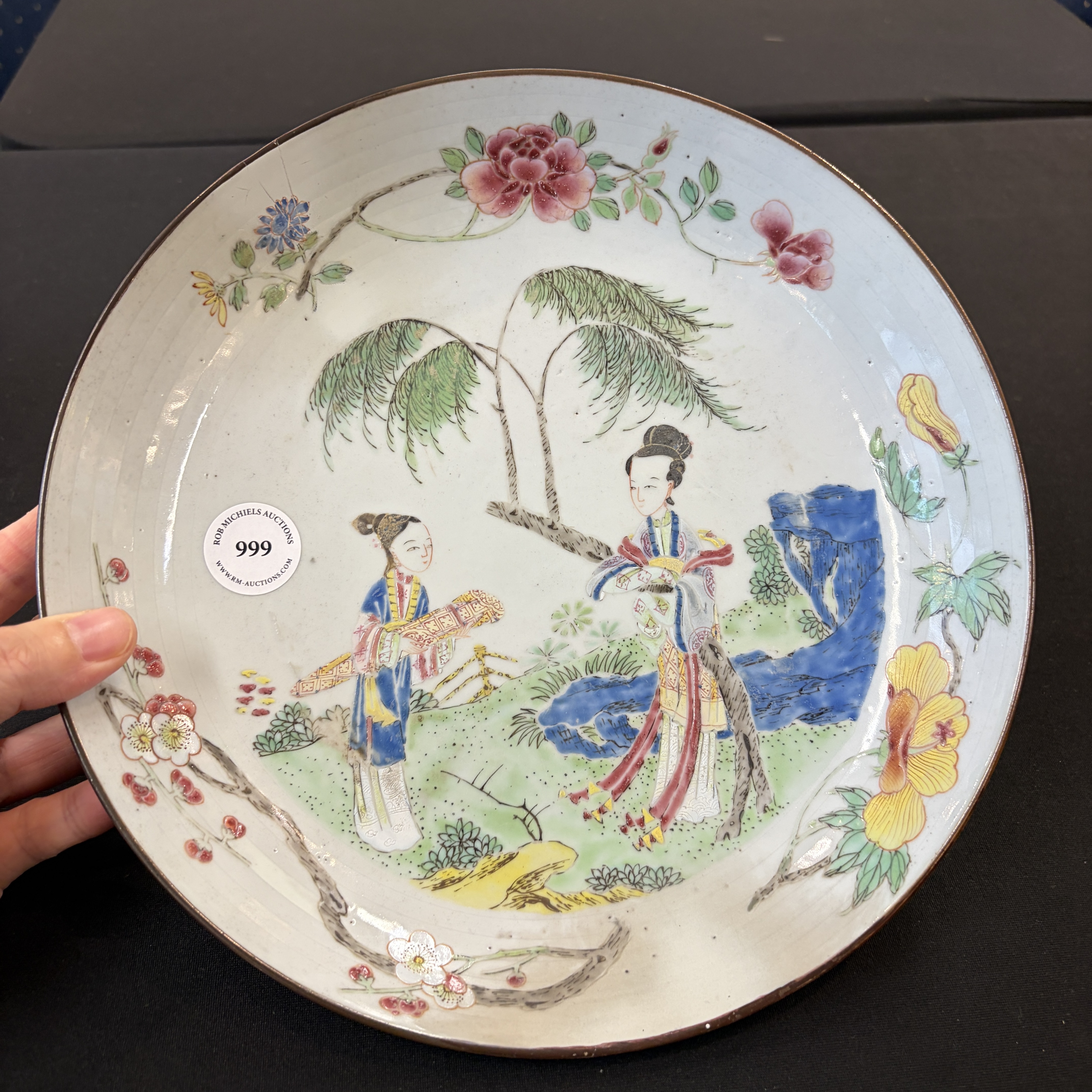 A Chinese famille rose 'Ladies in a Garden' plate — photo 1