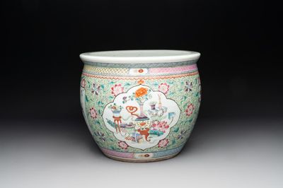 A Chinese famille rose lime-green-ground jardinière with birds, flowers and antiquities, 19th C.