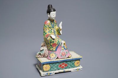 A Chinese famille rose model of a seated lady, Yongzheng