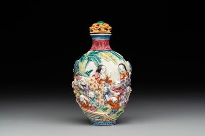A Chinese famille rose moulded snuff bottle, Qianlong mark, late 18th/early 19th C.