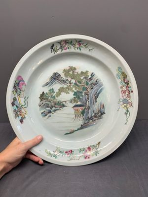 A Chinese famille rose 'mountainous river landscape' dish, 19th C. — photo 2