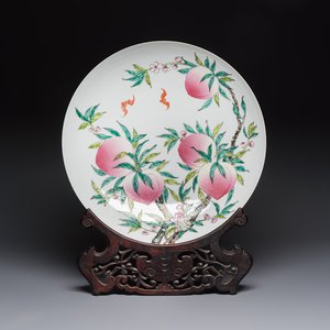 A Chinese famille rose 'Nine Peaches' dish on wooden stand, Yongzheng mark, 20th C. — photo 1