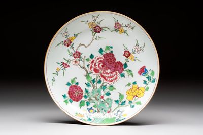 A Chinese famille rose 'peonies and plum blossoms' dish, Yongzheng