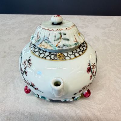 A Chinese famille rose 'Pheasant among Flowering Branches' teapot and cover with relief design — photo 4