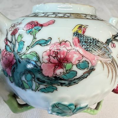 A Chinese famille rose 'Pheasant among Flowering Branches' teapot and cover with relief design — photo 8