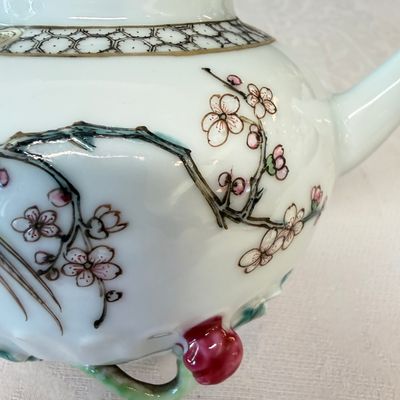 A Chinese famille rose 'Pheasant among Flowering Branches' teapot and cover with relief design — photo 9