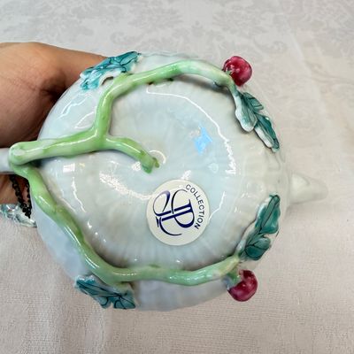 A Chinese famille rose 'Pheasant among Flowering Branches' teapot and cover with relief design — photo 10