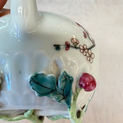 A Chinese famille rose 'Pheasant among Flowering Branches' teapot and cover with relief design — photo 13