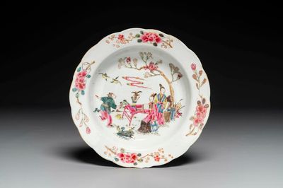 A Chinese famille rose plate with figures in a garden, Yongzheng
