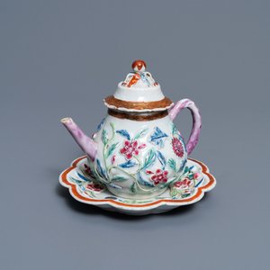 A Chinese famille rose relief-decorated teapot on stand, Yongzheng — photo 1