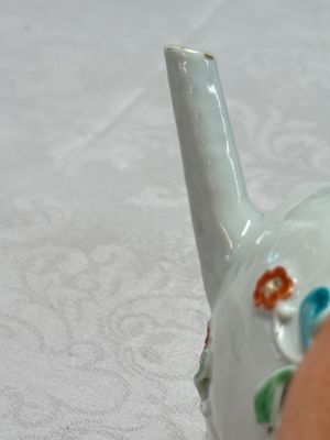 A Chinese famille rose relief-decorated teapot with floral design — photo 14