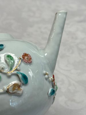 A Chinese famille rose relief-decorated teapot with floral design — photo 15
