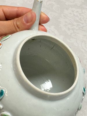 A Chinese famille rose relief-decorated teapot with floral design — photo 17