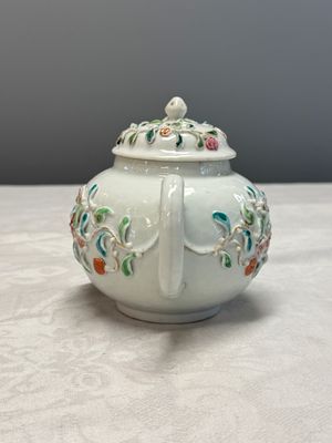 A Chinese famille rose relief-decorated teapot with floral design — photo 2
