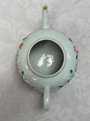 A Chinese famille rose relief-decorated teapot with floral design — photo 6