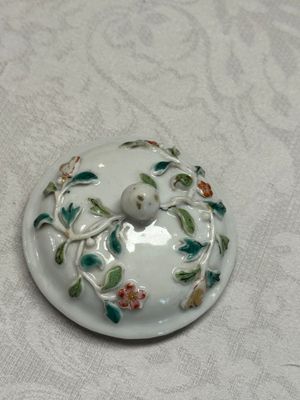 A Chinese famille rose relief-decorated teapot with floral design — photo 9