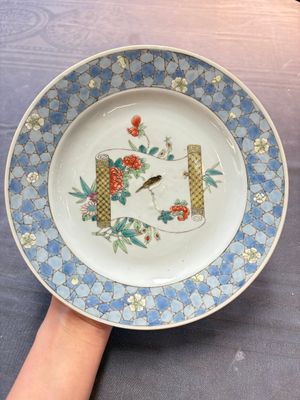 A Chinese famille rose ruby-back plate with a bird on a blossoming branch, Yongzheng — photo 1