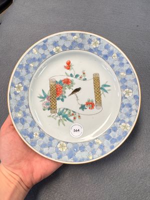 A Chinese famille rose ruby-back plate with a bird on a blossoming branch — photo 1