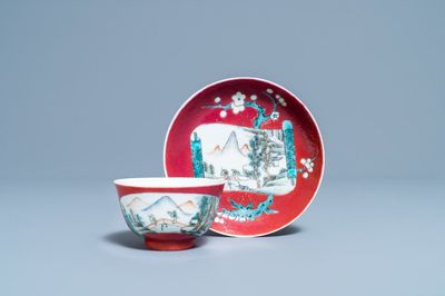 A Chinese famille rose ruby-ground cup and saucer, Yongzheng
