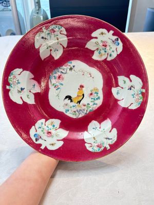 A Chinese famille rose ruby-ground 'rooster' dish, Yongzheng — photo 1