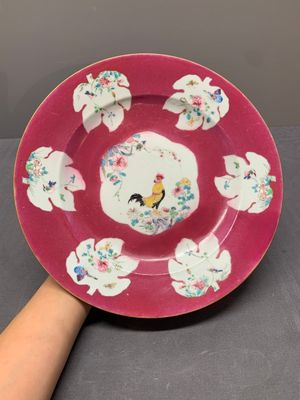 A Chinese famille rose ruby-ground 'rooster' dish, Yongzheng — photo 1