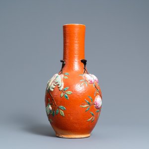 A Chinese famille rose 'sanduo' vase with applied design on a coral red ground, 19th C. — photo 4