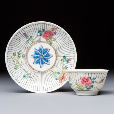 A Chinese famille rose tea bowl and saucer with floral design, Yongzheng