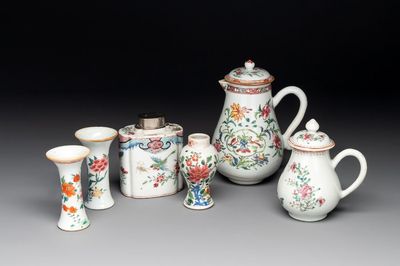 A Chinese famille rose tea caddy, two covered milk jugs and three vases, Yongzheng/Qianlong