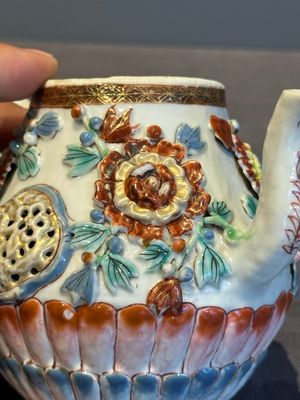 A Chinese famille rose teapot and stand with floral relief design, Qianlong — photo 9