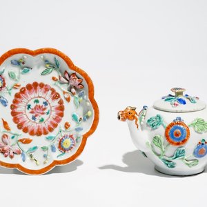 A Chinese famille rose teapot on stand with applied decoration, Yonzheng — photo 1