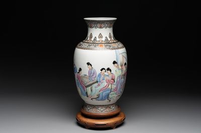 A Chinese famille rose vase with ladies on wooden stand, Qianlong mark, Republic
