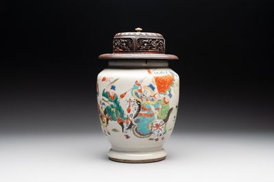 A Chinese famille rose 'warrior on horseback' vase and a wooden cover, Yongzheng/Qianlong