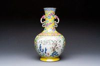 A Chinese famille rose yellow-ground 'Bats and Peaches' bottle vase, Jiaqing/Daoguang