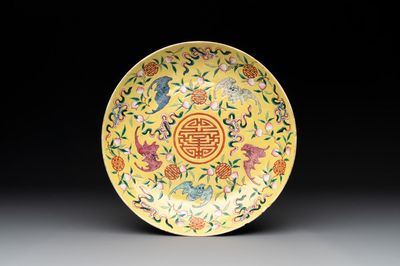 A Chinese famille rose yellow-ground 'bats and peaches' plate, Tongzhi mark and of the period