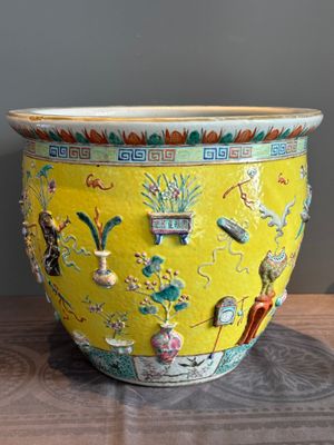 A Chinese famille rose yellow-ground relief-molded 'antiquities' fish bowl, Zhengde mark, 19th C. — photo 1
