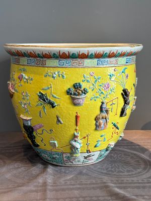 A Chinese famille rose yellow-ground relief-molded 'antiquities' fish bowl, Zhengde mark, 19th C. — photo 2