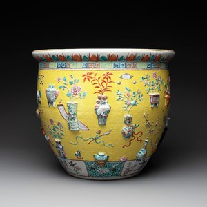 A Chinese famille rose yellow-ground relief-molded 'antiquities' fish bowl, Zhengde mark, 19th C. — photo 1
