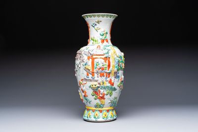 A Chinese famille verte '100 Boys' vase with relief design, 20th C.