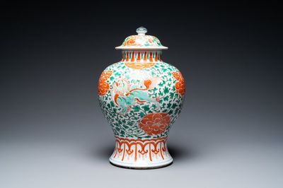 A Chinese famille verte 'Buddhist lions' vase and cover, Kangxi