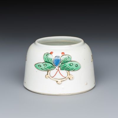 A Chinese famille verte 'Butterflies' water pot with relief design, Kangxi
