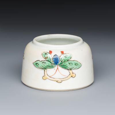 A Chinese famille verte 'Butterflies' water pot with relief design, Kangxi