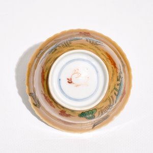 A Chinese famille verte café au lait ground cup and saucer, Kangxi, together with a famille rose teapot stand, Yongzheng — photo 9