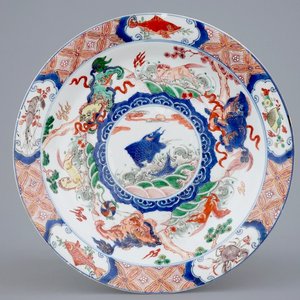 A Chinese famille verte dish with a carp surrounded by horses and buddhist lions, Kangxi — photo 1