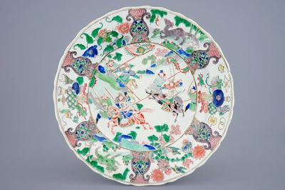 A Chinese famille verte dish with a war scene, Kangxi