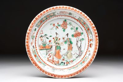 A Chinese famille verte 'elegant beauties in a garden' plate, Kangxi