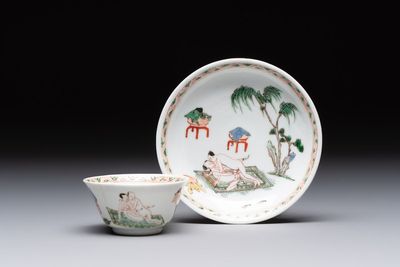 A Chinese famille verte 'erotic' cup and saucer, lingzhi mark, Kangxi