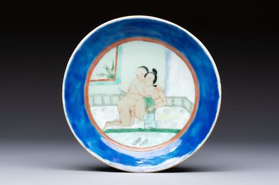 A Chinese famille verte 'Erotic Subject' plate, 19th C.